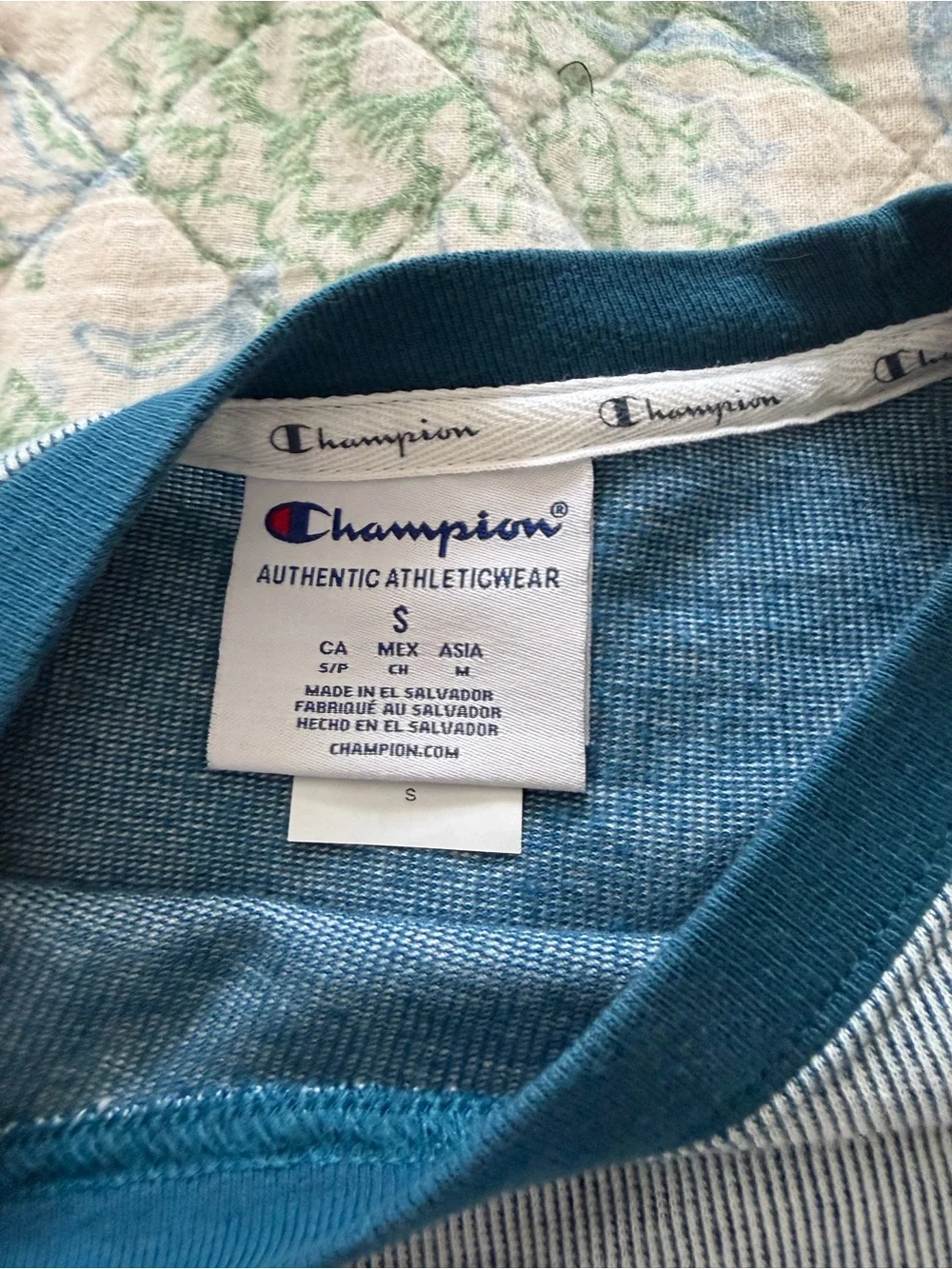 Champion blue cropped tshirt with navy trim neckline, sleeves,hem, size S